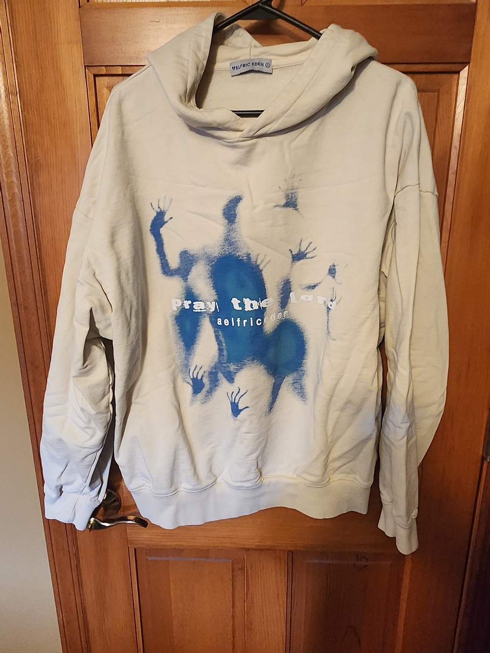 Aelfric Eden Cream Crewneck Hoodie with Blue Graphic